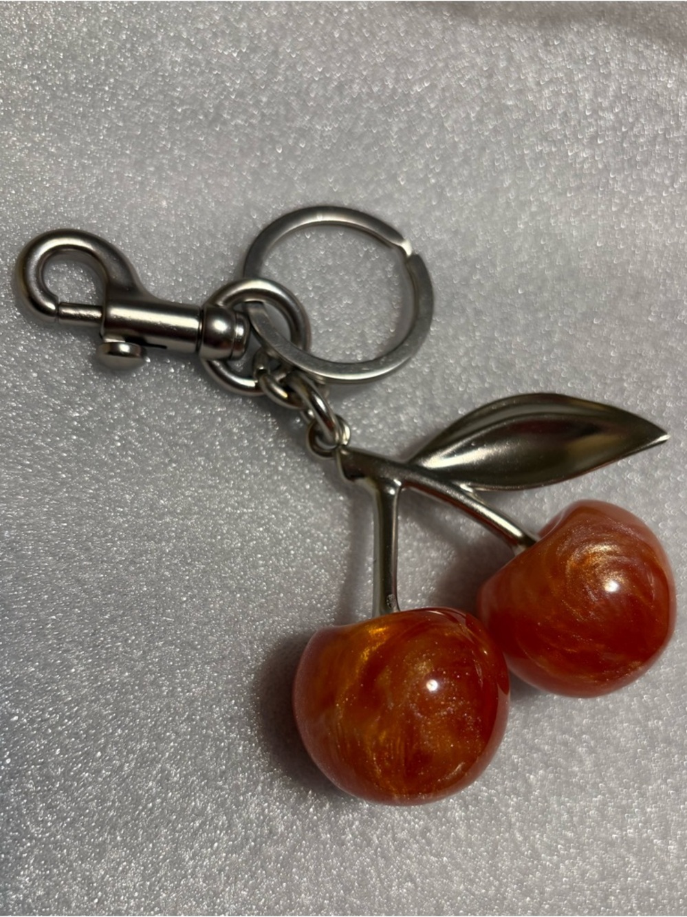 Peach/orange marbled Silver tone Cherry Bag Charm/keychain Swirled